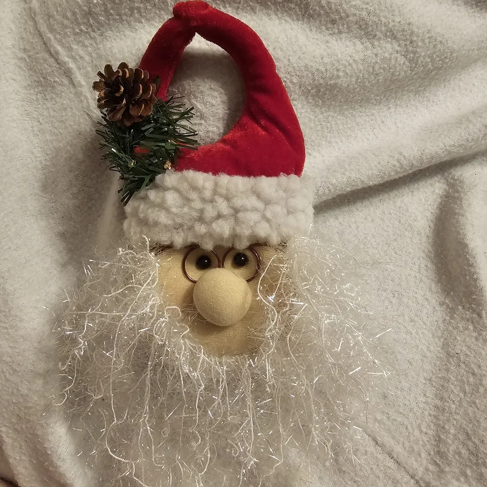 Bundle of Christmas decorations including vintage door hanger